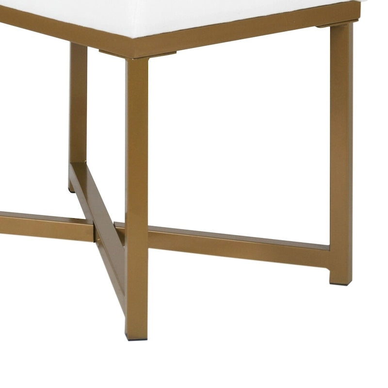 Banc à cadre métallique avec assise tapissée en velours capitonné, blanc et or